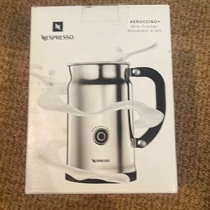 Brand new in box. Nespresso milk frother